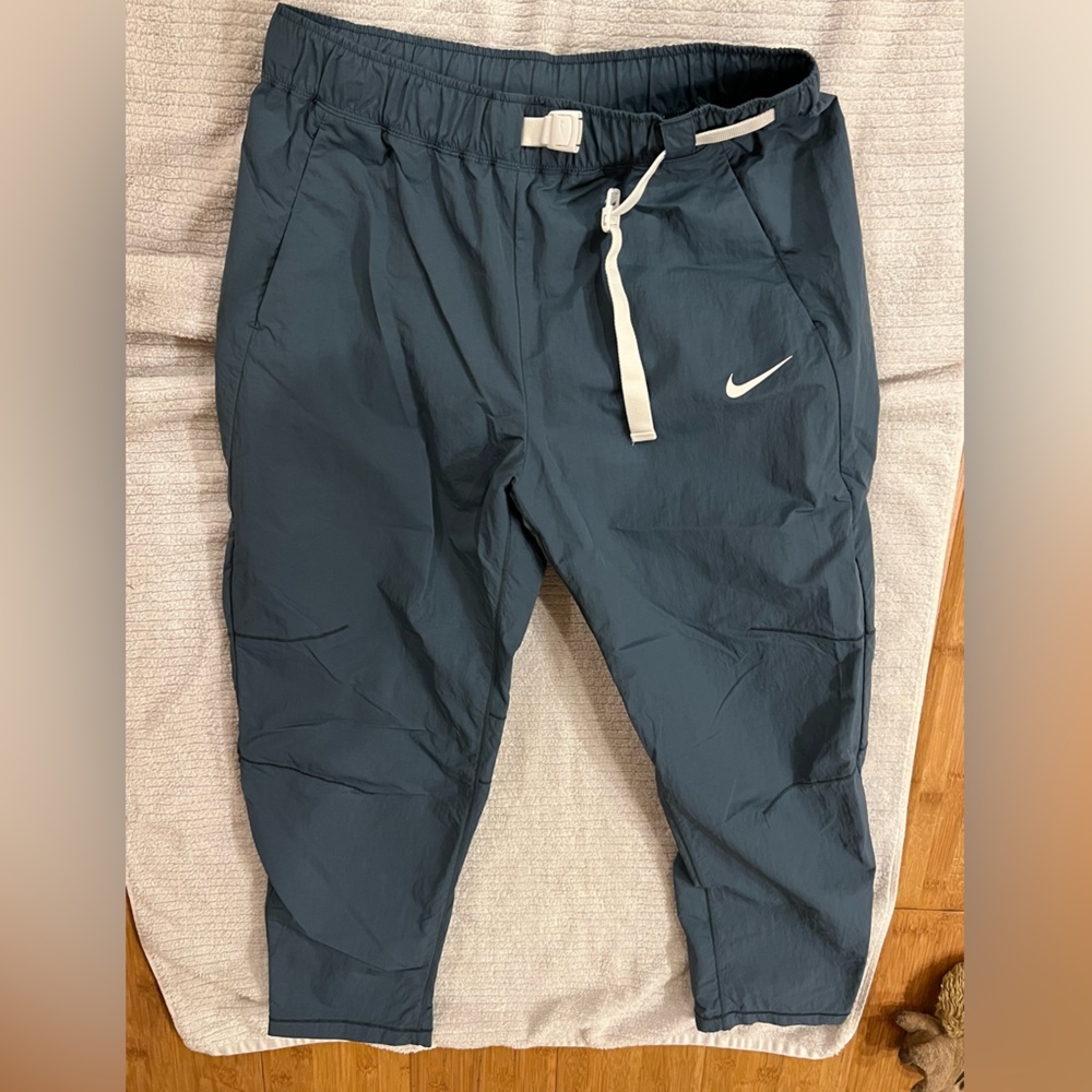 Nike Women’s Sportswear Tech Pack Women’s Woven Pants.